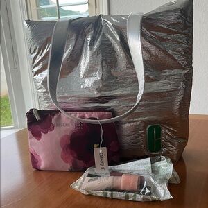 Clinique Metallic Silver Tote with Pink Floral Pouch and Beauty Essentials